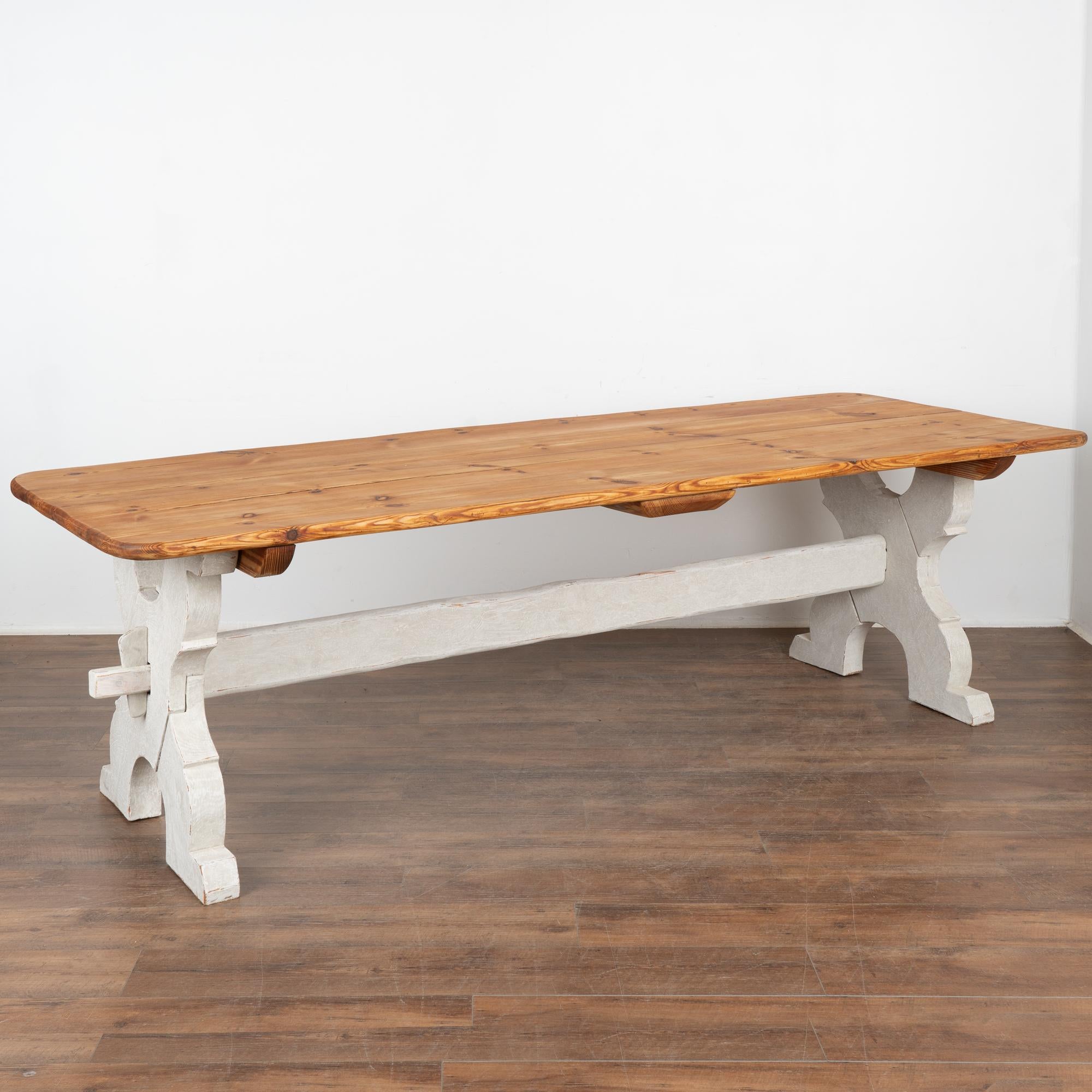 This old pine farm table is loaded with aged patina and warmth that come from generations of use. 
The strong 