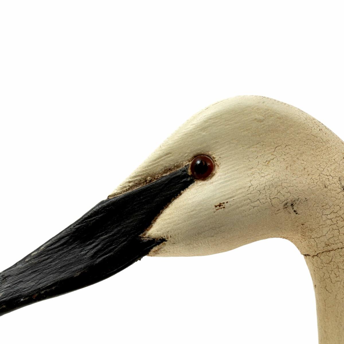 A large white painted wood swan decoy with black beak by American folk artist Thomas Langan, Roslyn Harbor, NY. 20th Century.

Dimensions: 
22 inches L x 4.7 inches D x 12.2 inches L