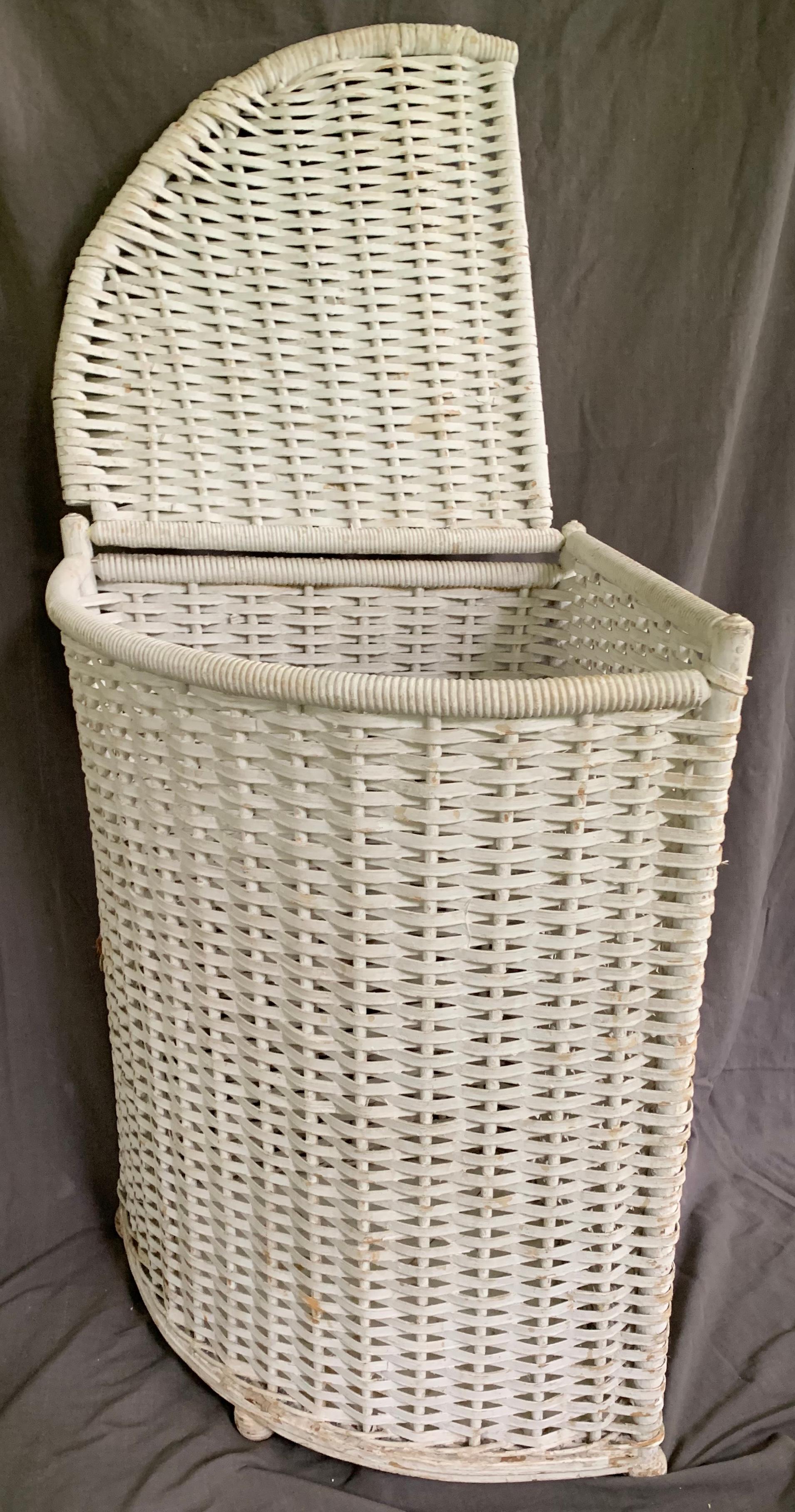 white corner wicker laundry basket