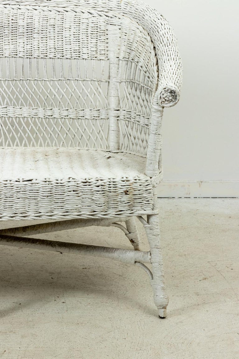 White Painted Wicker Settee For Sale at 1stDibs