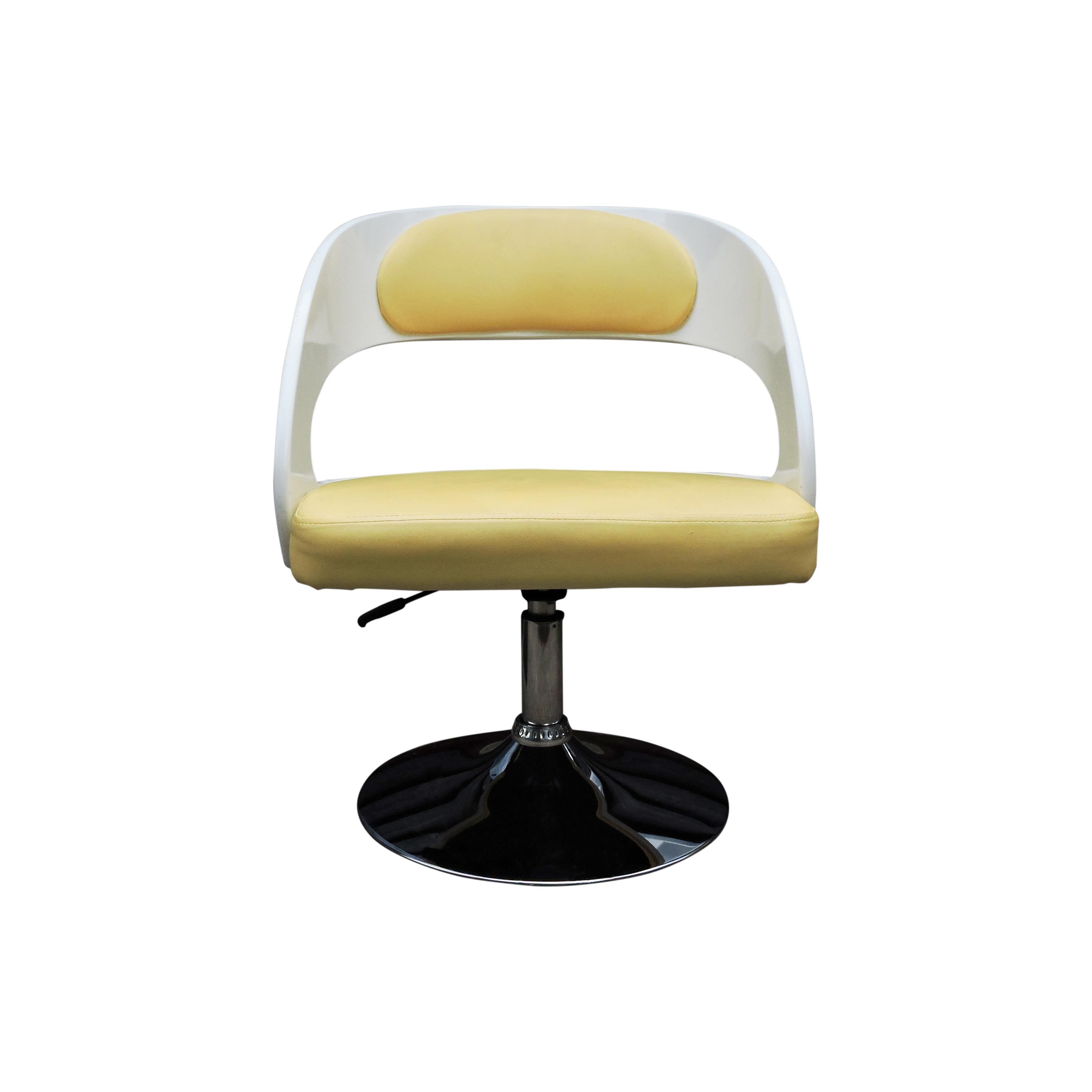 This set of four white-painted wooden salon chairs feature yellow faux hide seat covers and are raised on chromium-plated, height adjustable bases.