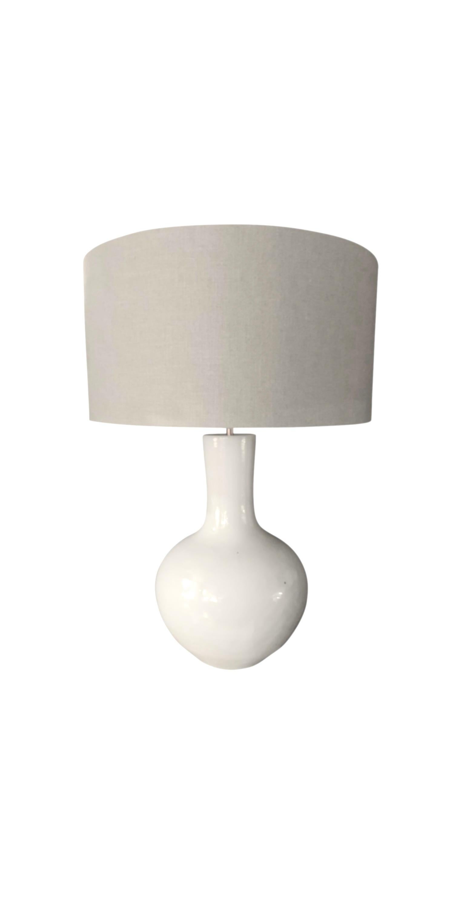 Contemporary Chinese pair extra large white tube neck shaped design lamps.
Linen shades included.
Base diameter 14
