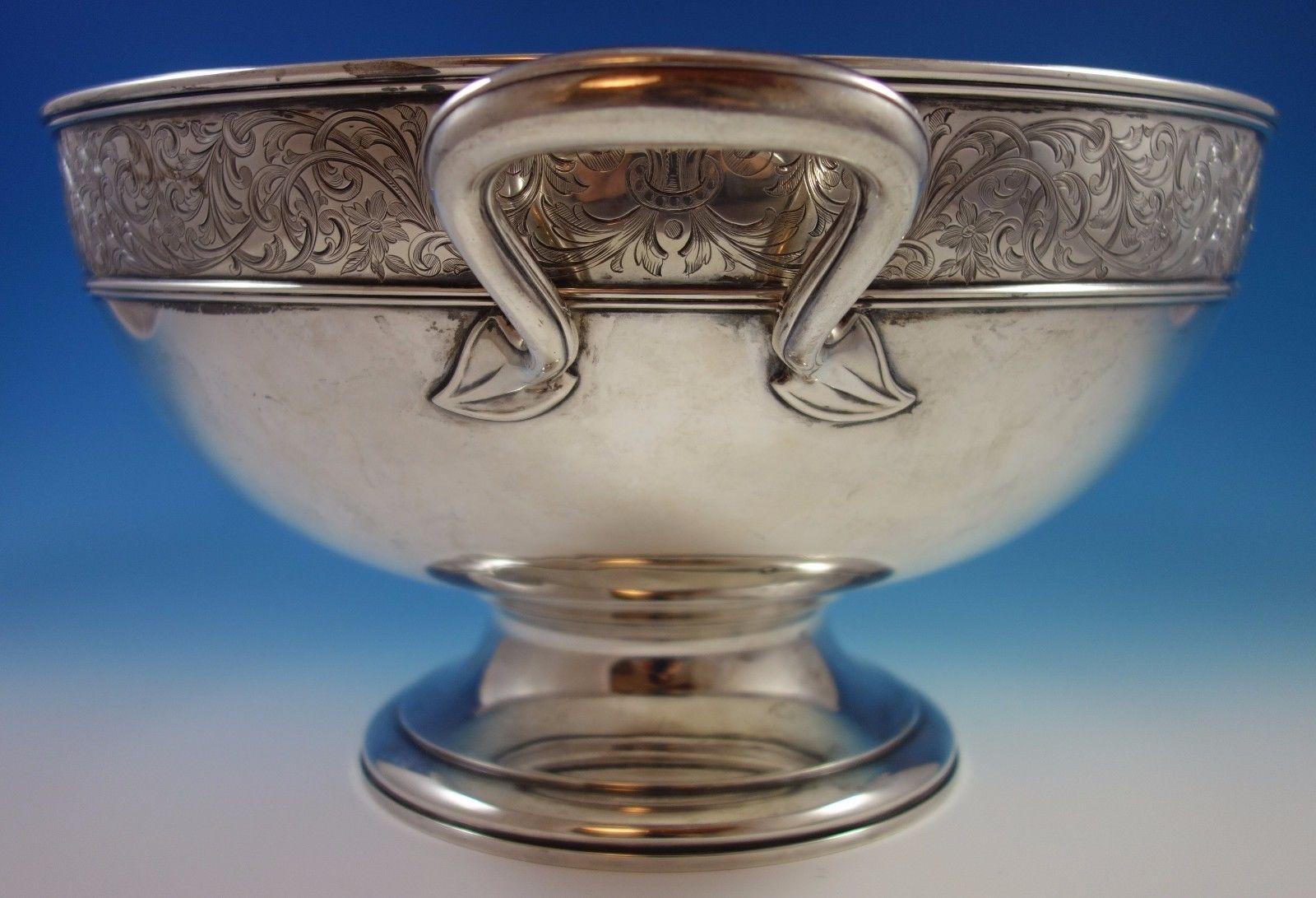 White paisley by Gorham
Finely made white paisley by Gorham sterling silver punch bowl. The piece has bright-cut scrollwork. It' s marked with custom order #4948 and #A2004. The bowl measures 8