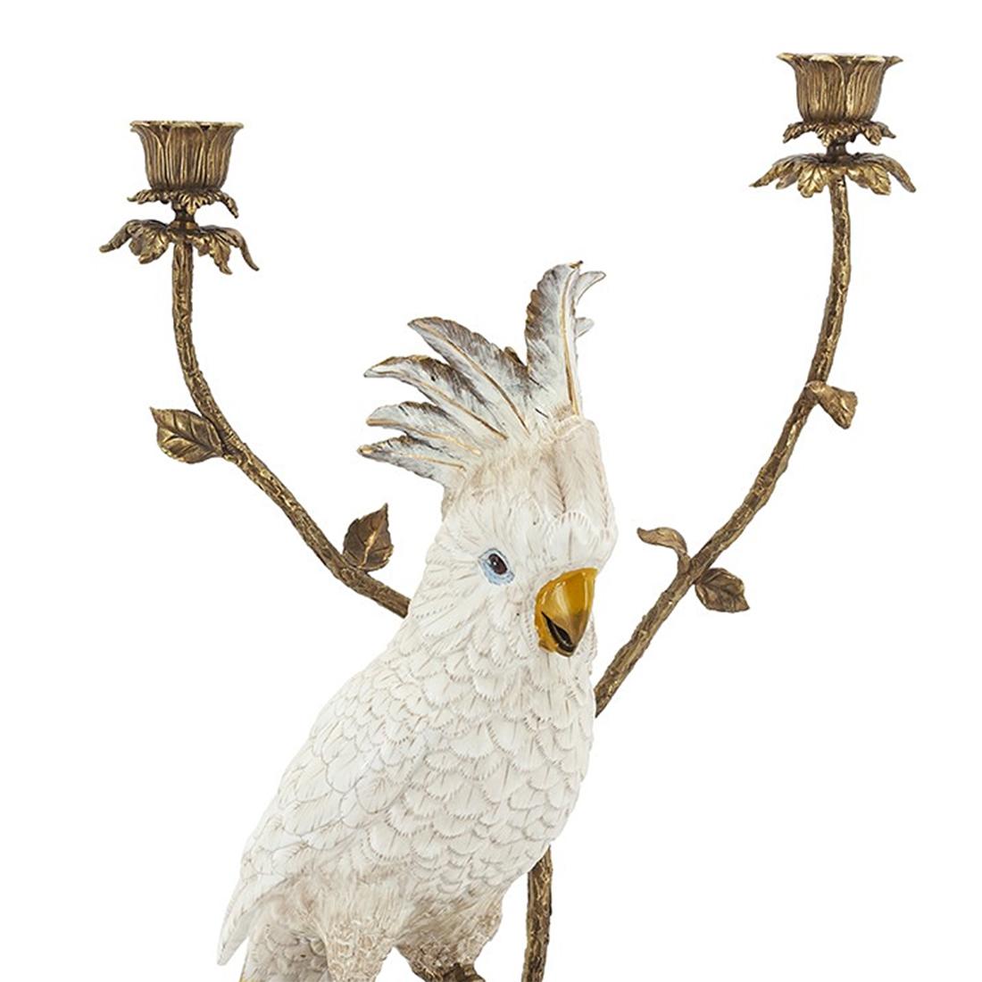 Candleholder white parrot all handcrafted in
porcelain. Hand painted and with details
in solid bronze. With 2 candleholders. Candles
not included.
 