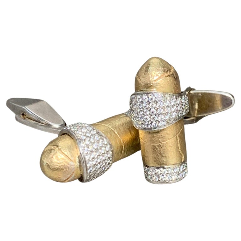 White Pavé Diamond Cigar Cuff Links.

Featuring White Pavé Diamond Cigar Cuff Links with a total weight of 1.30 carats, set in 14K White Gold & 14K Yellow Gold. 

This one-of-a-kind pair of cuff links was created by hand and in CAD, Computer Aided