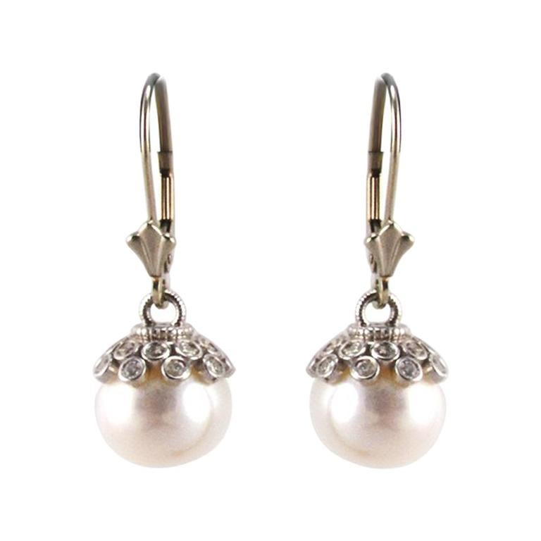 White Pearl and Diamond Earrings in 14 Karat White Gold
