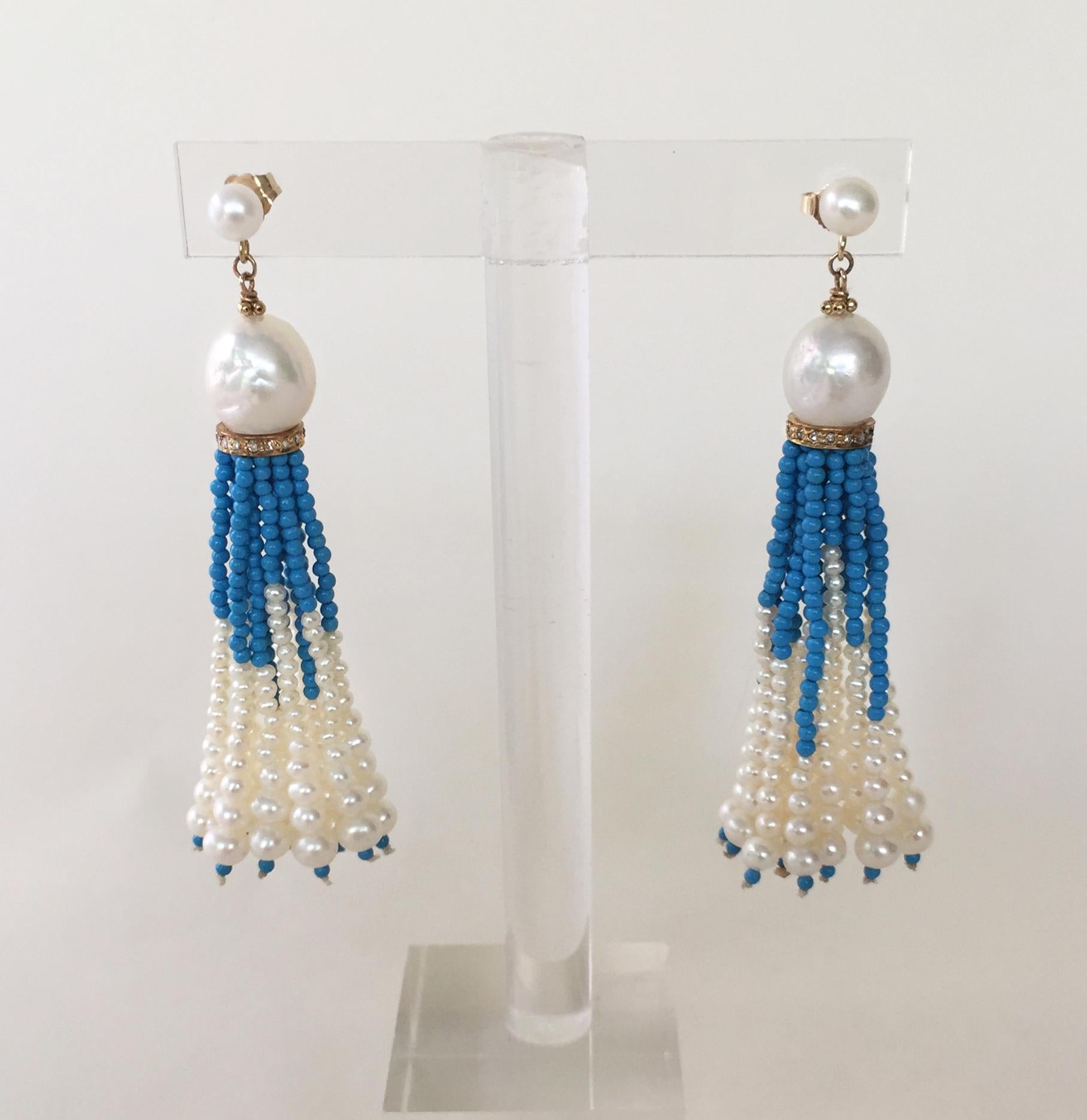  These white pearl and turquoise tassel earrings are accented with delicate diamond encrusted gold plated silver roundels. Uniquely varied lengths of graduated turquoise and white pearl strands are emitting from an 8 mm Baroque white pearl. The ends