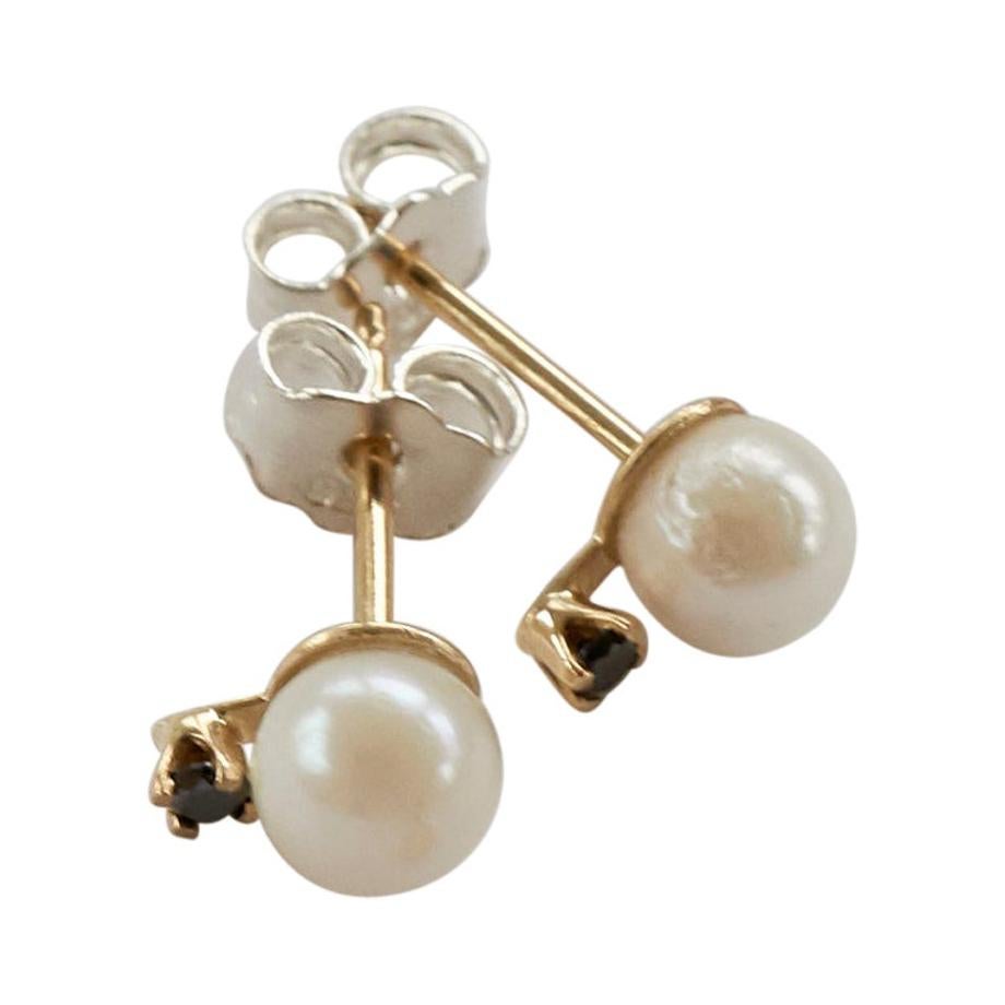 Pendientes de botón de oro con perla blanca y diamante negro en venta