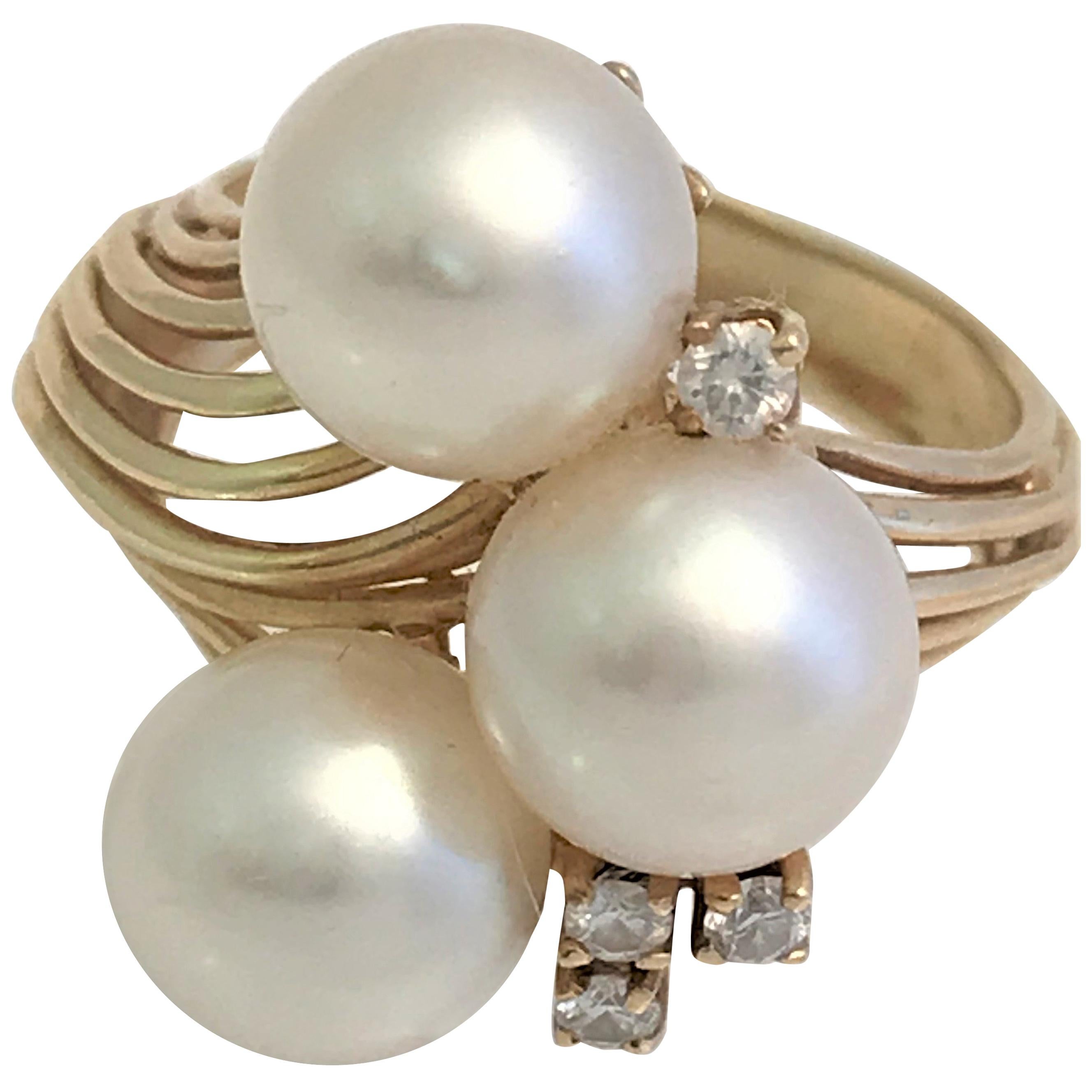 Ring aus 14 Karat Gold mit weißer weißer Perle und Diamant