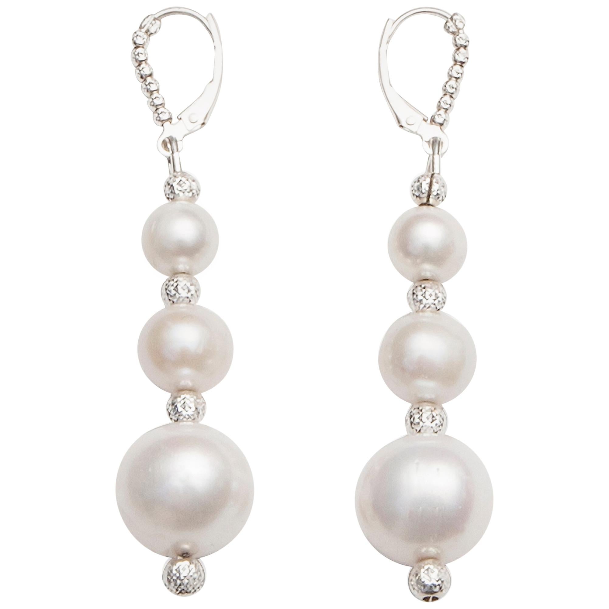 White Pearl Drop Earrings in a Three-Tiered Design For Sale