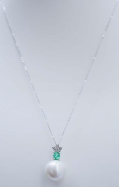 White Pearl, Emerald, Diamonds, Platinum Pendant.