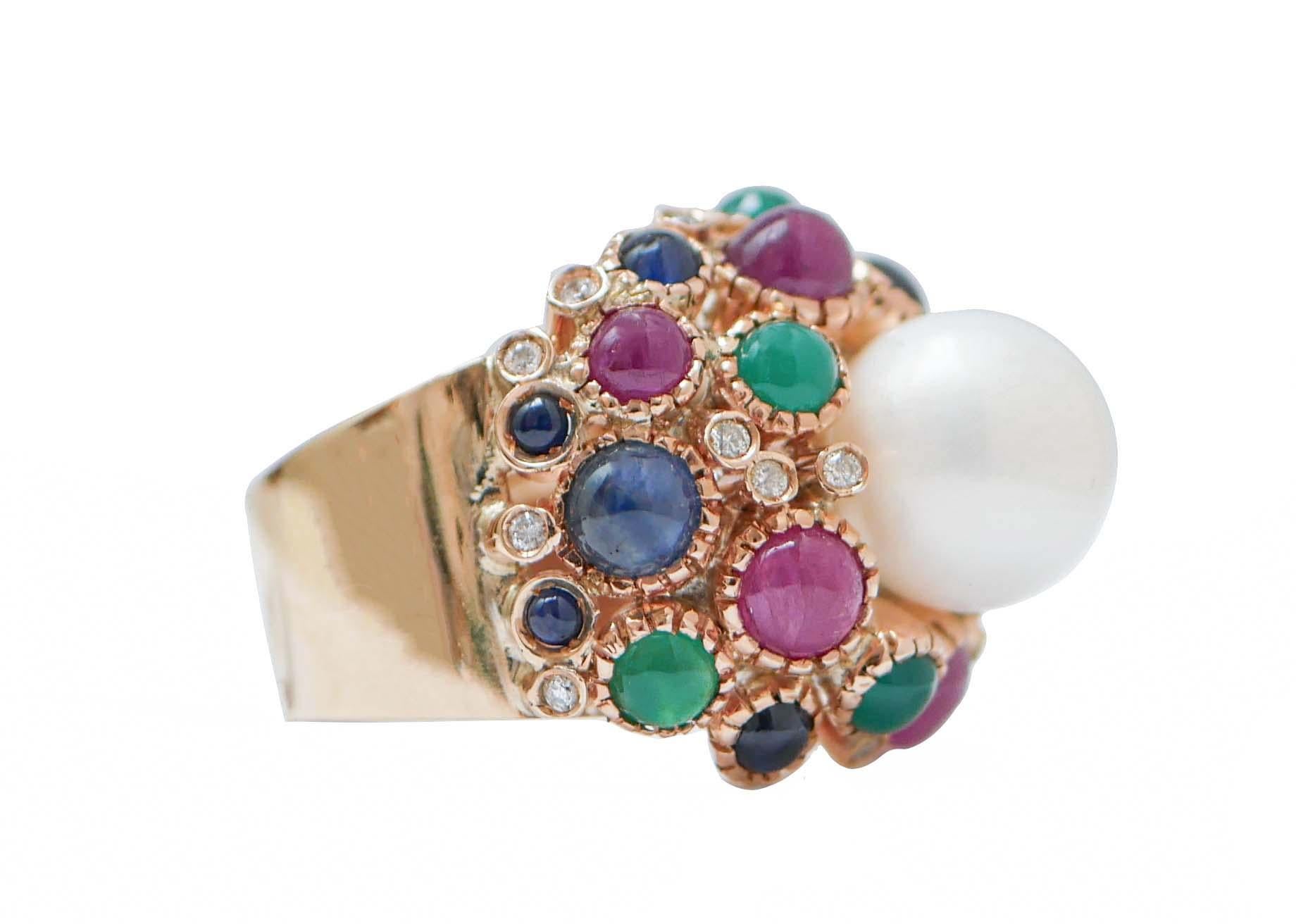 Amazing ring in 14 kt rose gold structure mounted with a central pearl surrounded by diamonds, rubies, emeralds and sapphires.
This ring was totally handmade by Italian master goldsmiths and it is in perfect conditions.
Diamonds 0.31 ct
Rubies and