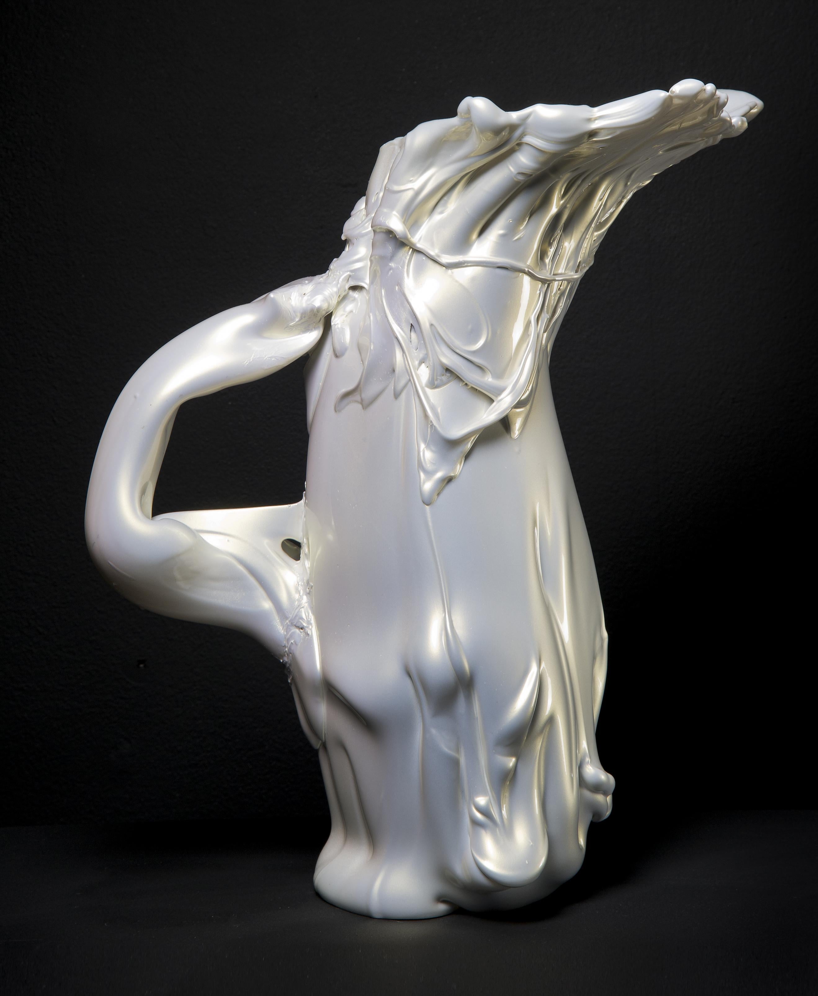 The White Pearl Pitcher II is a unique white glass sculpture with a lustrous finish by the Swedish artist Fredrik Nielsen. The artist literally freehand sculpts his glass to create these monumental artworks. This piece has been finished with car