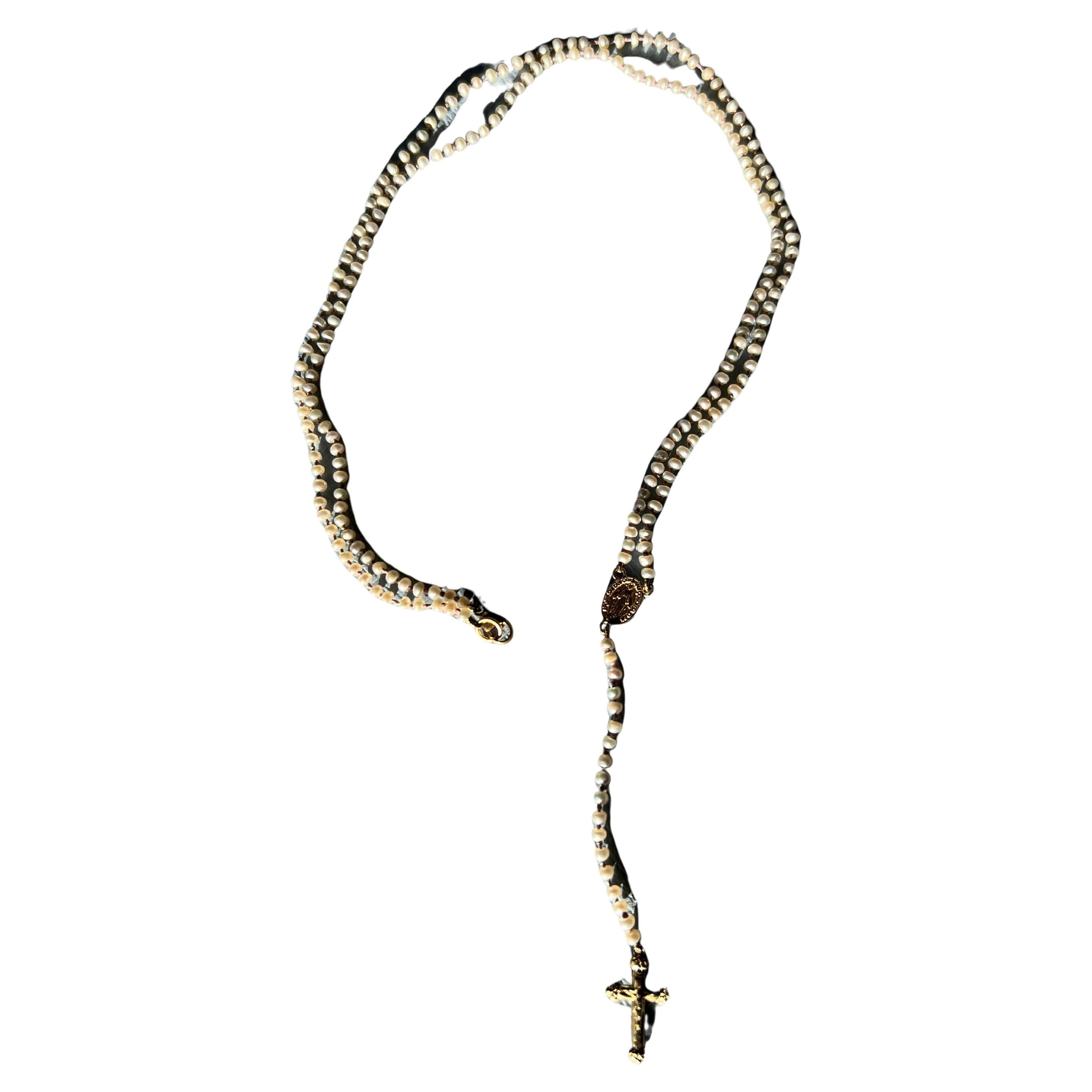 Perla Blanca Rosario Crucifijo Collar de Oro Virgen María  

La longitud alrededor del cuello es de 61 cm y la longitud total de la caída es de 39 cm.

Los símbolos o medallas pueden convertirse en una poderosa herramienta de nuestro arsenal para lo