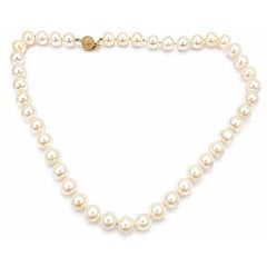 Collana a filo di perle bianche in oro giallo 14k