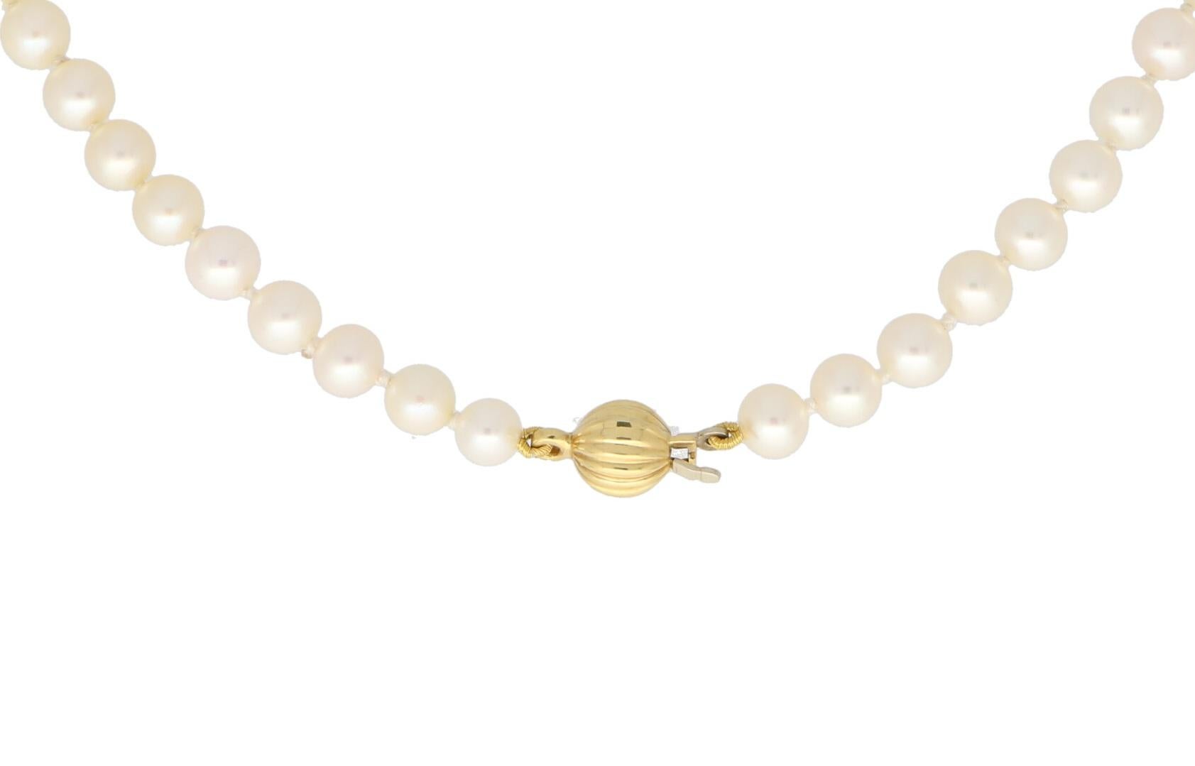Modern White Pearl Strand Necklace Set with a 18k Yellow Gold Fluted Clasp