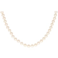 White Pearl Strand Necklace Set with a 18k Yellow Gold Fluted Clasp