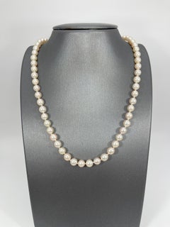 White Pearl Strand Necklace with Platinum Diamond Pearl Clasp