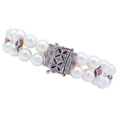 Bracelet Retrò en perles blanches, grenats, diamants, or rose et argent