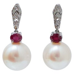 Boucles d'oreilles en or blanc 14 carats, rubis, diamants
