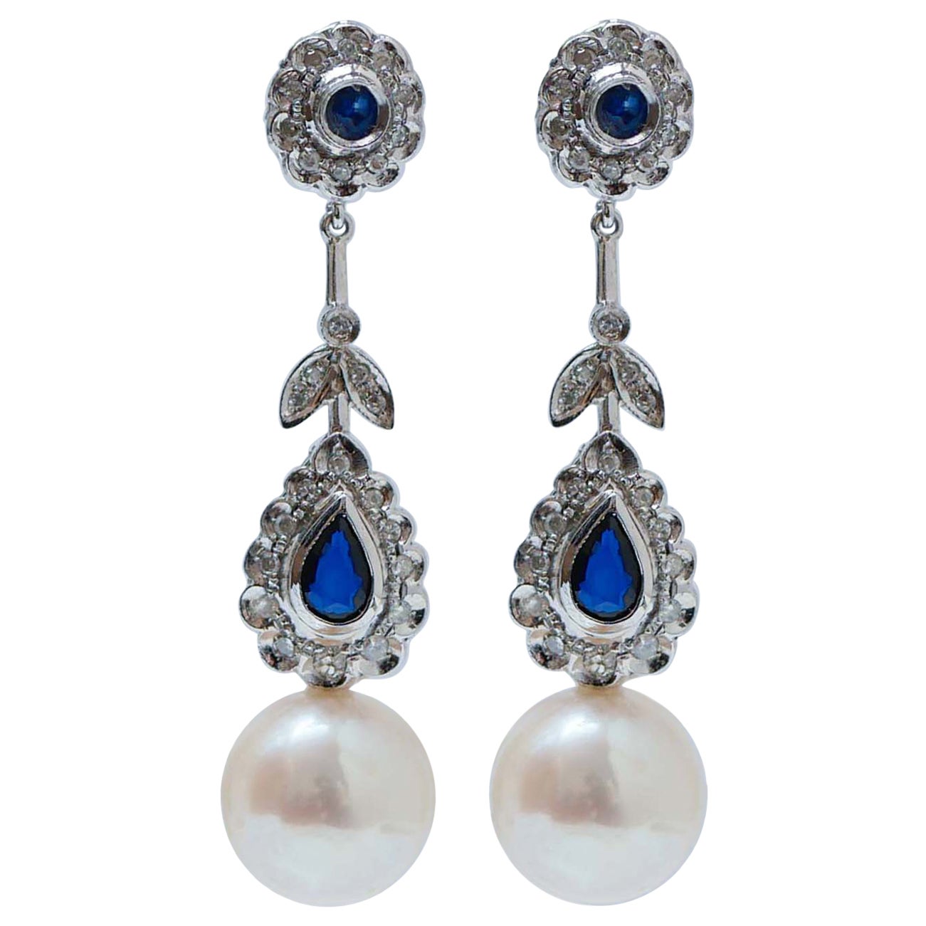 Pendants d'oreilles en platine, saphirs, diamants et perles blanches