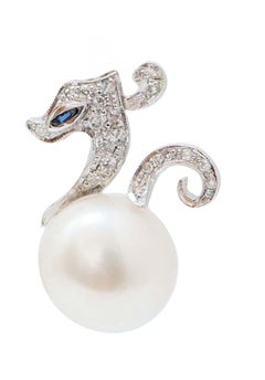 White Pearls, Sapphires, Diamonds, Platinum Horse Earrings.