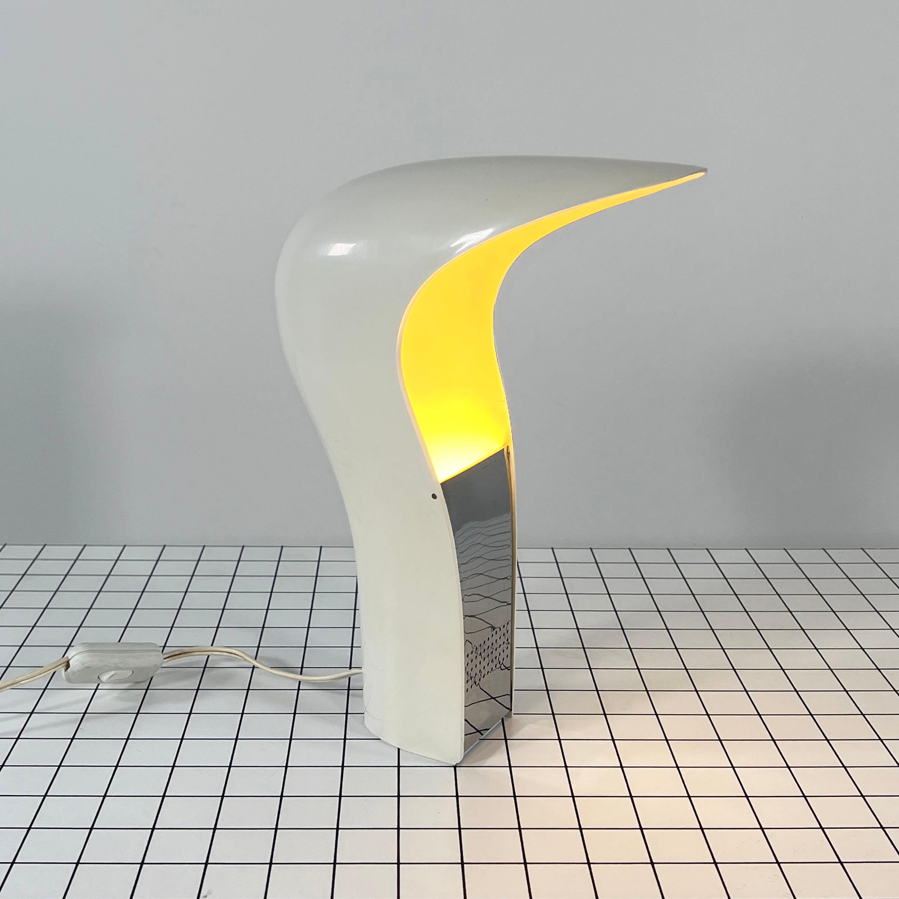 Designer - Cesare Casati & C. Emanuele Ponzio (Studio D.A.) 
Producer - Lamperti
Model - Pelota desk lamp 
Design Period - Seventies
Measurements - Width 11 cm x Depth 22 cm x Height 28 cm
Materials - Plastic, metal
Color - White, silver.
Comments -