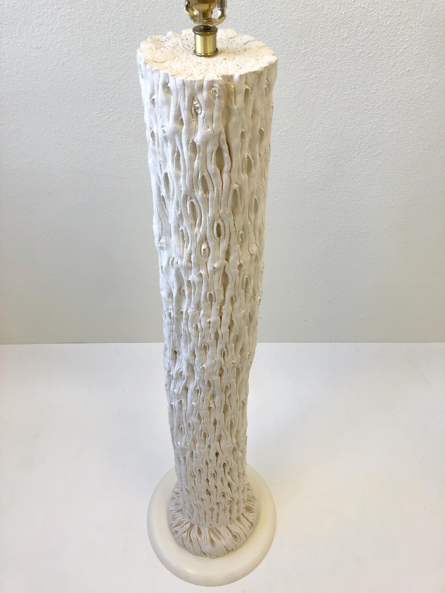 A spectacular cast plaster and polish brass Saguaro floor lamp from the 1980s. The lamp is newly rewired and new vanilla linen shade.
Measures: Dimensions 65.75” high 24” diameter.
Base is 15.5” diameter.