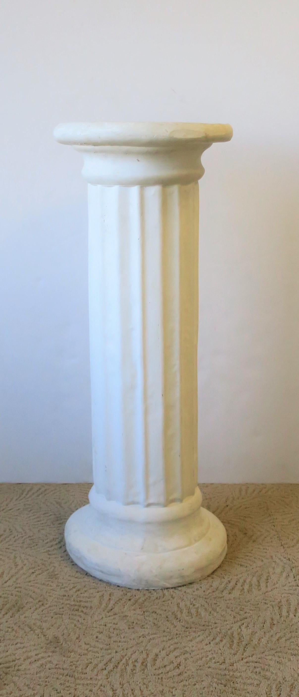 white column pedestal