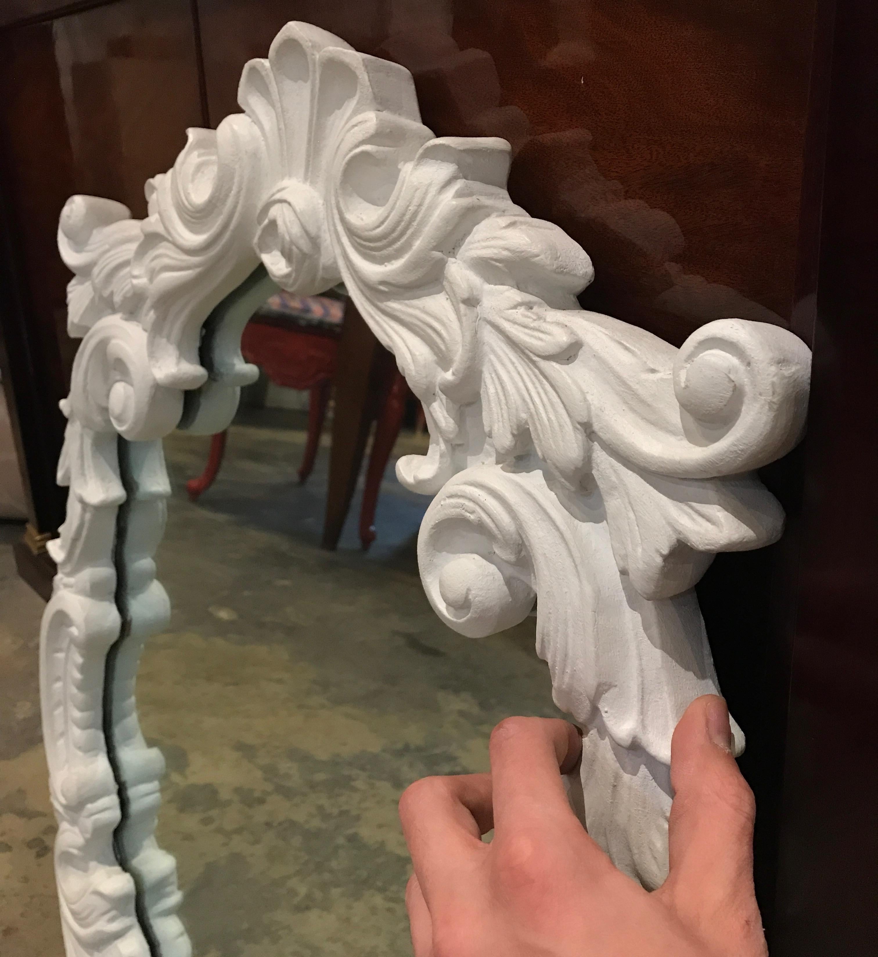 white plaster mirror