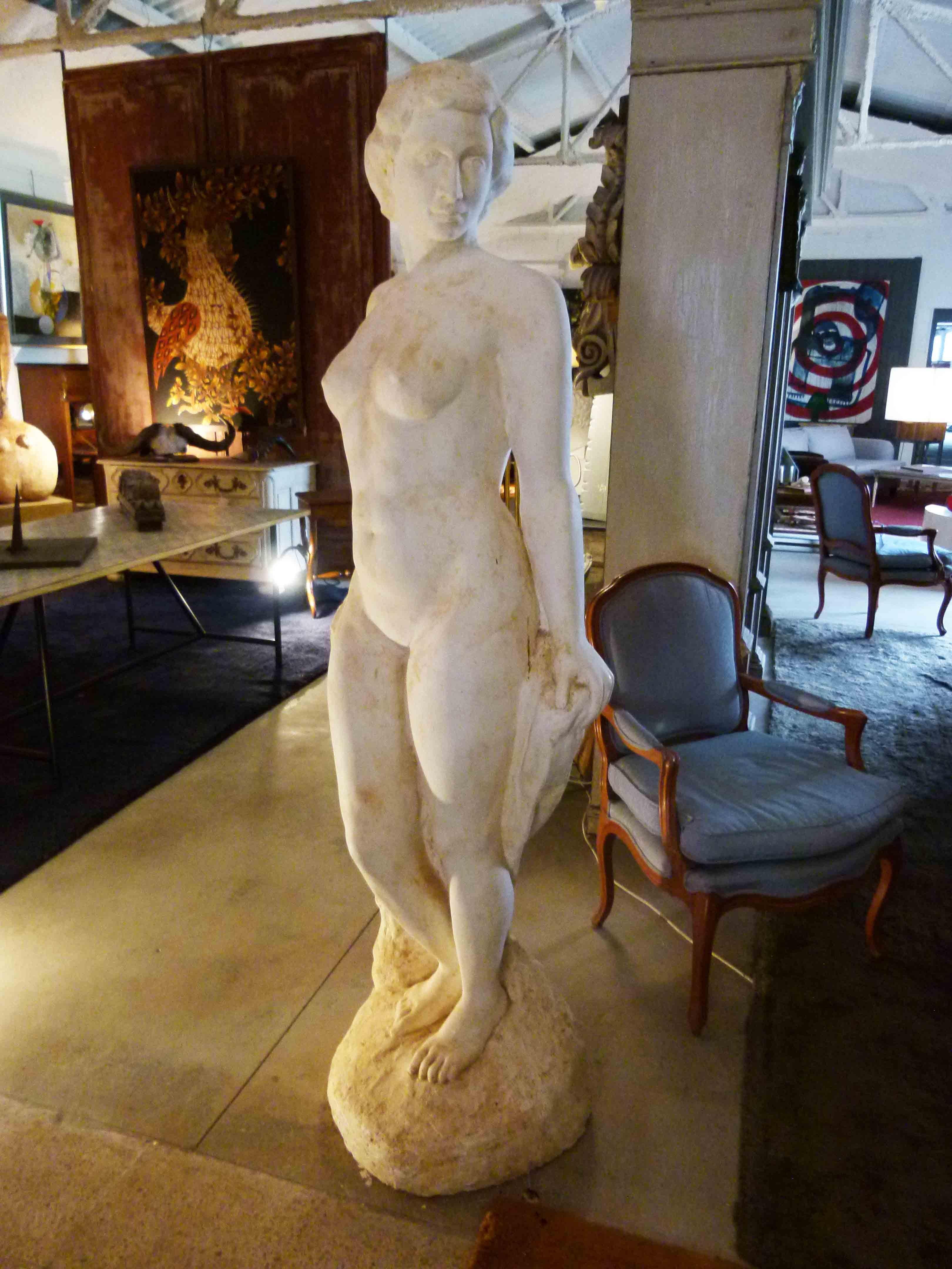 White plaster nude standing woman sculpture.
Hand carved without mold.

 