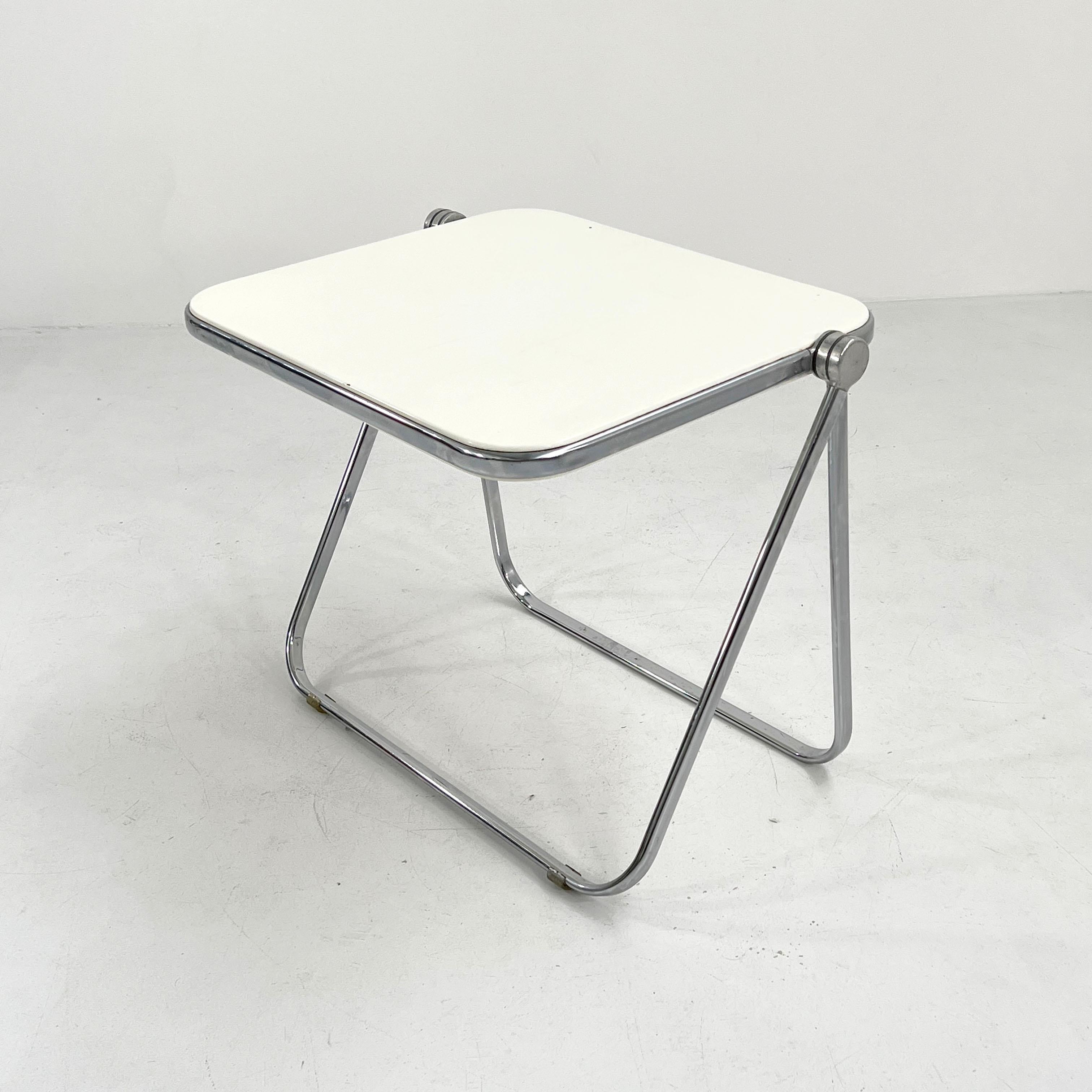 Designer - Giancarlo Piretti
Producer - Anonima Castelli
Model - Platone Folding Desk 
Design Period - Seventies
Measurements - Width 82 cm x Depth 65 cm x Height 70 cm
Materials - Perspex, Steel
Color - White, Silver
Condition - Good