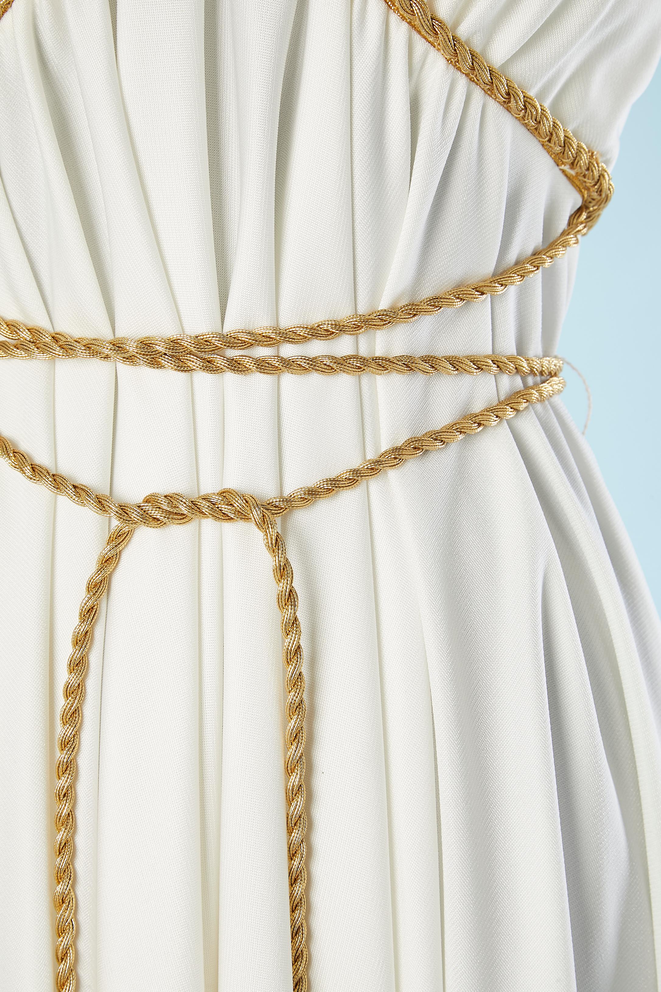 White polyester cocktail dress with gold lurex braid passementerie finish with fringes. Zip and hook&eye in the middle back. Lining only on the bust and back. 
Lord & Taylor is America's first and oldest department store in NY City 
SIZE 8 Us
