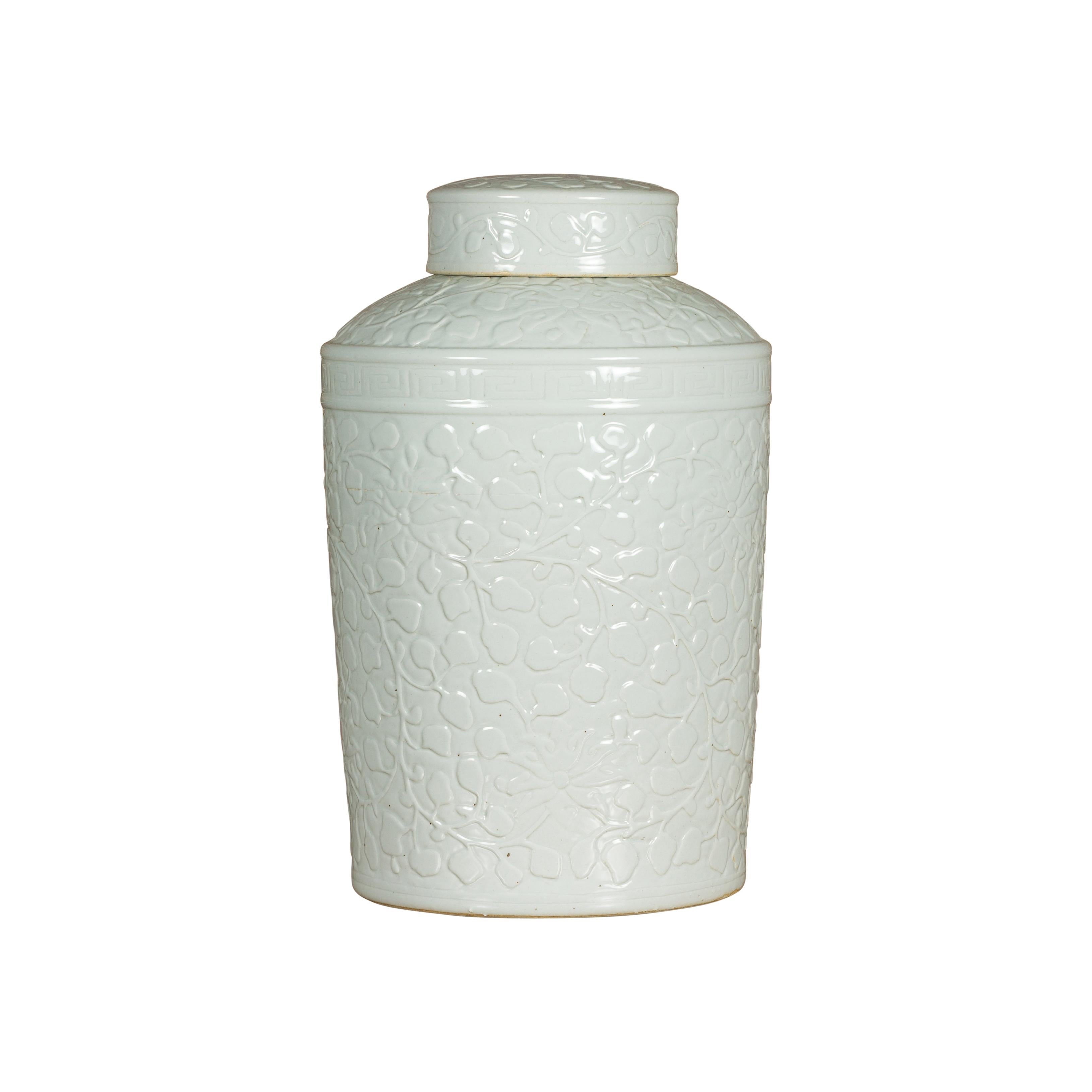 White Porcelain Asian Lidded Jar with Scrolling Foliage Motifs For Sale 8