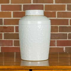 White Porcelain Asian Lidded Jar with Scrolling Foliage Motifs