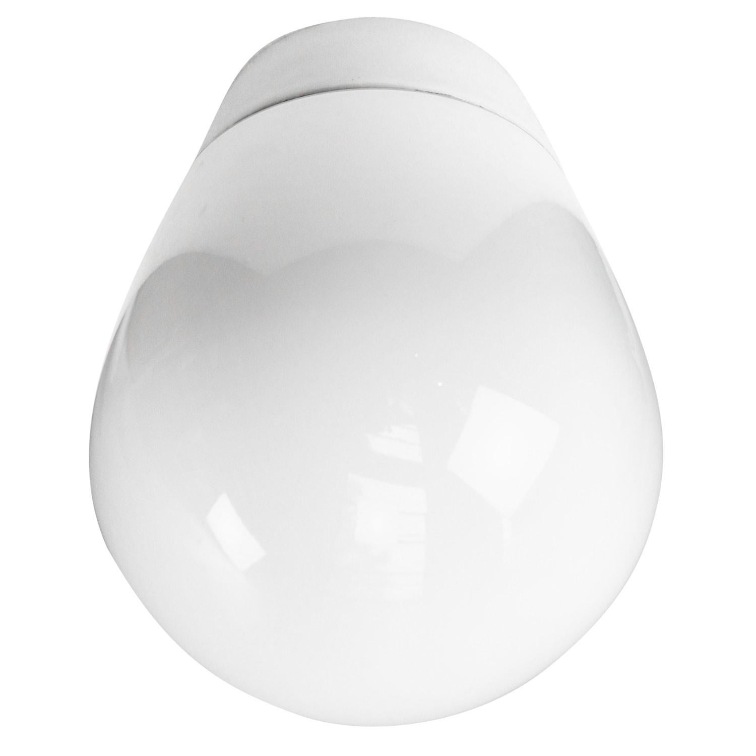 Porcelain wall lamp / scone by Lindner no. 6001
Designed by Wilhelm Wagenfeld
White porcelain, white opaline glass.

2 conductors, no ground.
Measures: Diameter foot 85 mm
Suitable for 110 volt USA
New wiring is UL listed (110 volt) or CE