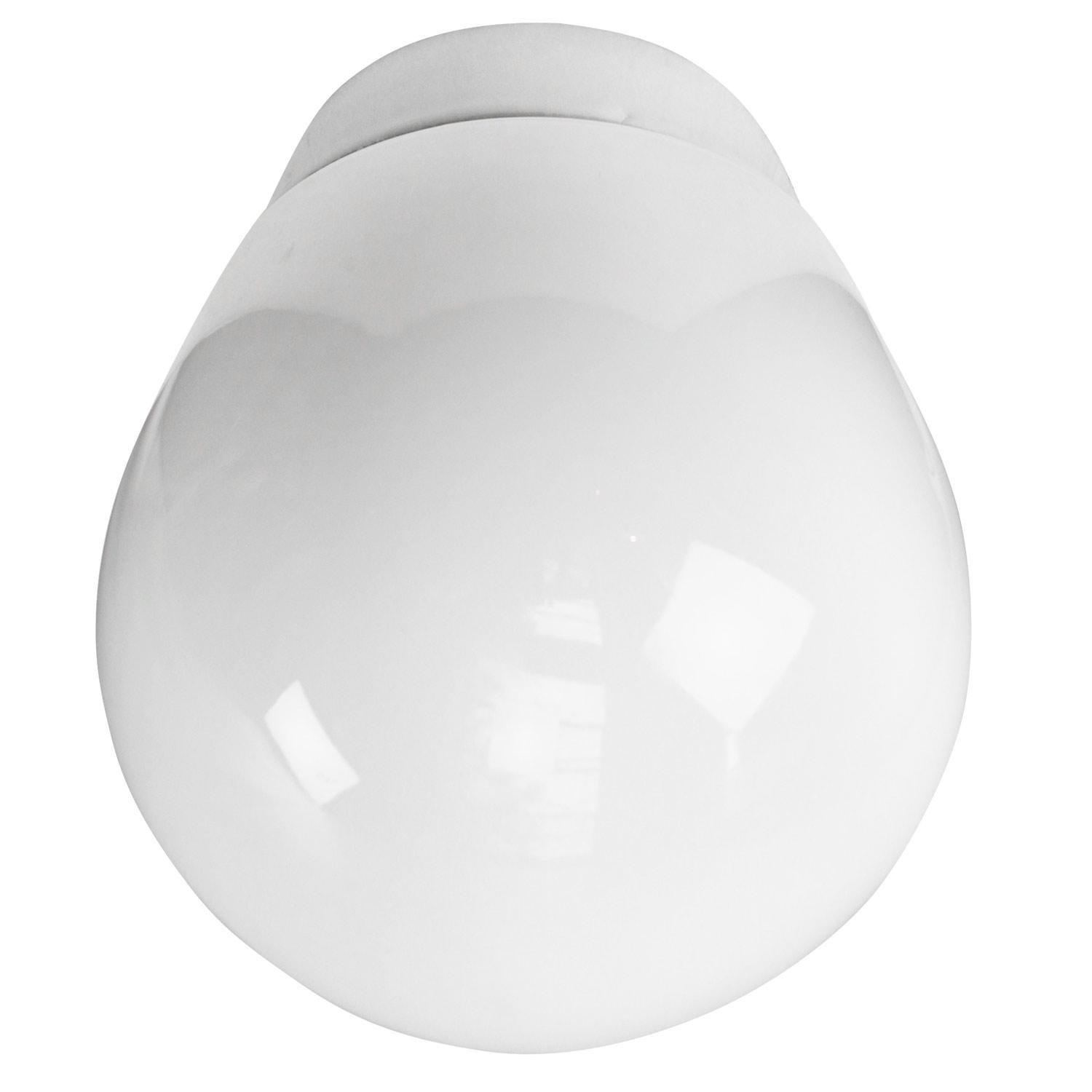 Porcelain wall lamp / scone by Lindner no. 6002
Designed by Wilhelm Wagenfeld
White porcelain, white opaline glass.

2 conductors, no ground.
Measures: Diameter foot 85 mm
Suitable for 110 volt USA
New wiring is UL listed (110 volt) or CE