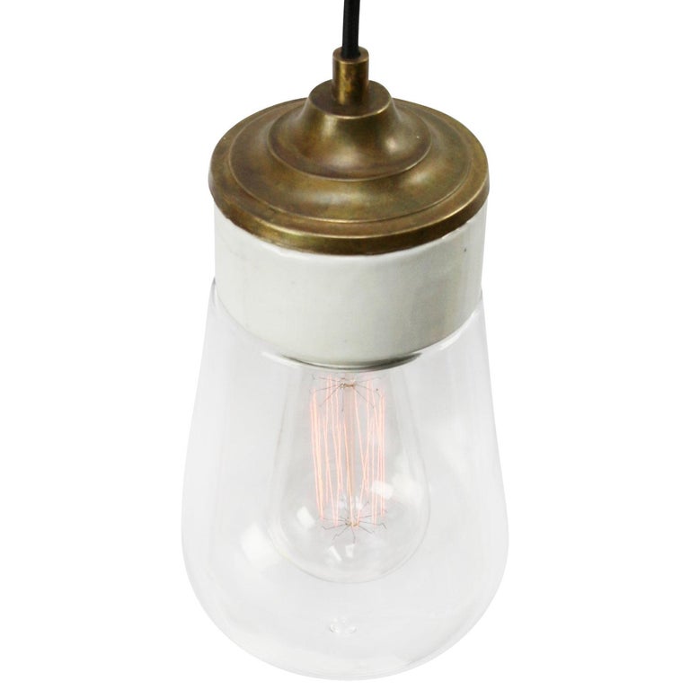 Porcelain industrial hanging lamp.
White porcelain, brass and clear glass.
2 conductors, no ground.

Weight: 1.20 kg / 2.6 lb

Priced per individual item. All lamps have been made suitable by international standards for incandescent light bulbs,