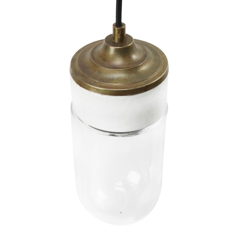 Porcelain Industrial hanging lamp.
White porcelain, brass and clear glass.
2 conductors, no ground.

Weight: 2.00 kg / 4.4 lb

Priced per individual item. All lamps have been made suitable by international standards for incandescent light