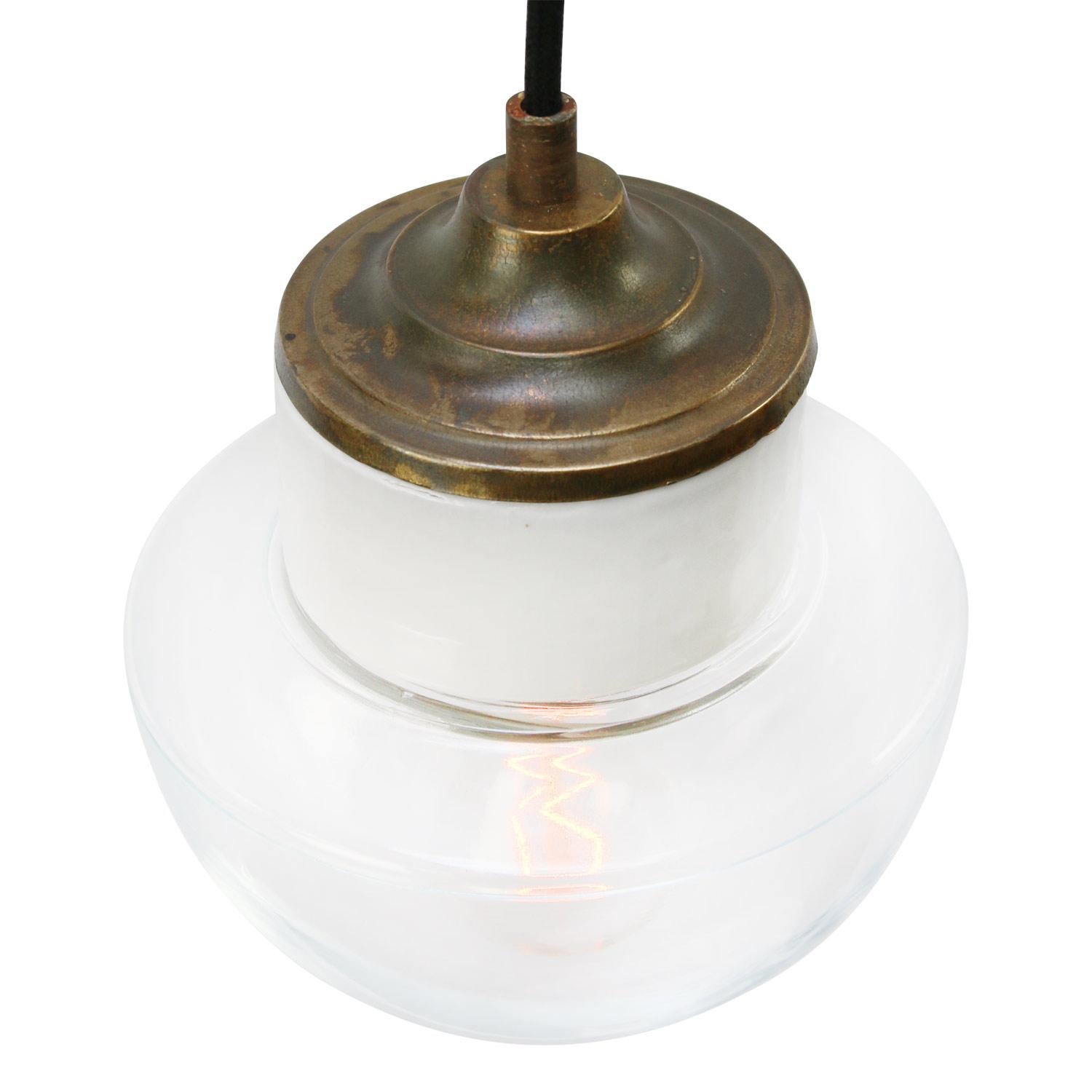 Porcelain industrial hanging lamp.
White porcelain, brass and clear glass.
2 conductors, no ground.

Weight: 2.00 kg / 4.4 lb

Priced per individual item. All lamps have been made suitable by international standards for incandescent light