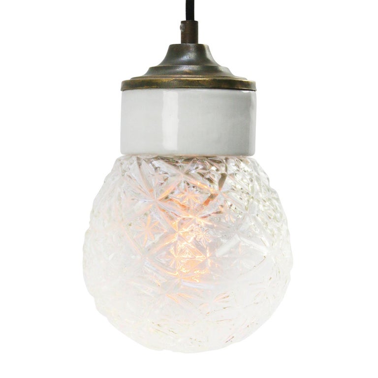 Porcelain industrial hanging lamp.
White porcelain, brass and clear texture glass.
2 conductors, no ground.

Weight: 1.20 kg / 2.6 lb

Priced per individual item. All lamps have been made suitable by international standards for incandescent
