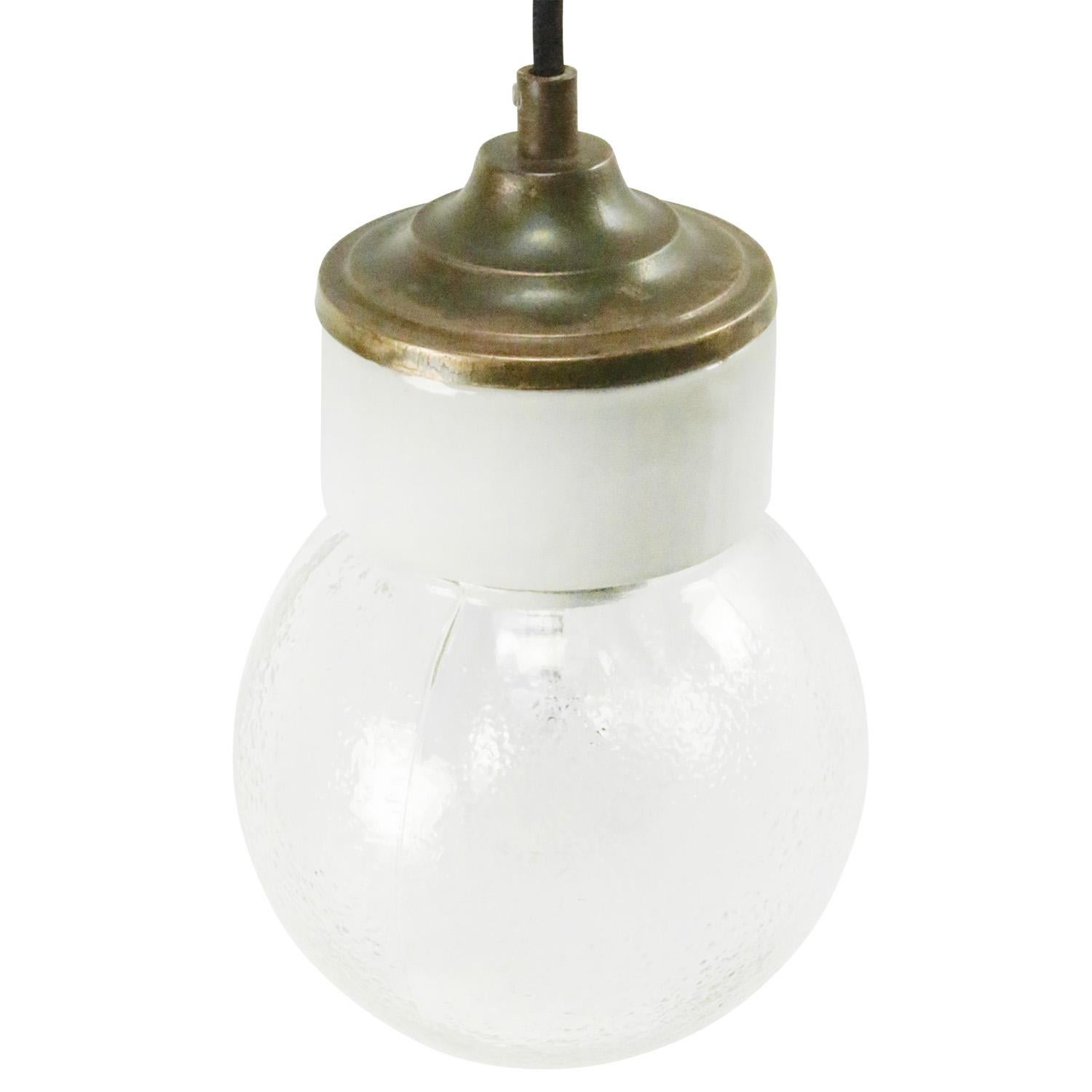 Porcelain industrial hanging lamp.
White porcelain, brass and clear textured glass.
2 conductors, no ground.

Weight: 1.40 kg / 3.1 lb

Priced per individual item. All lamps have been made suitable by international standards for incandescent