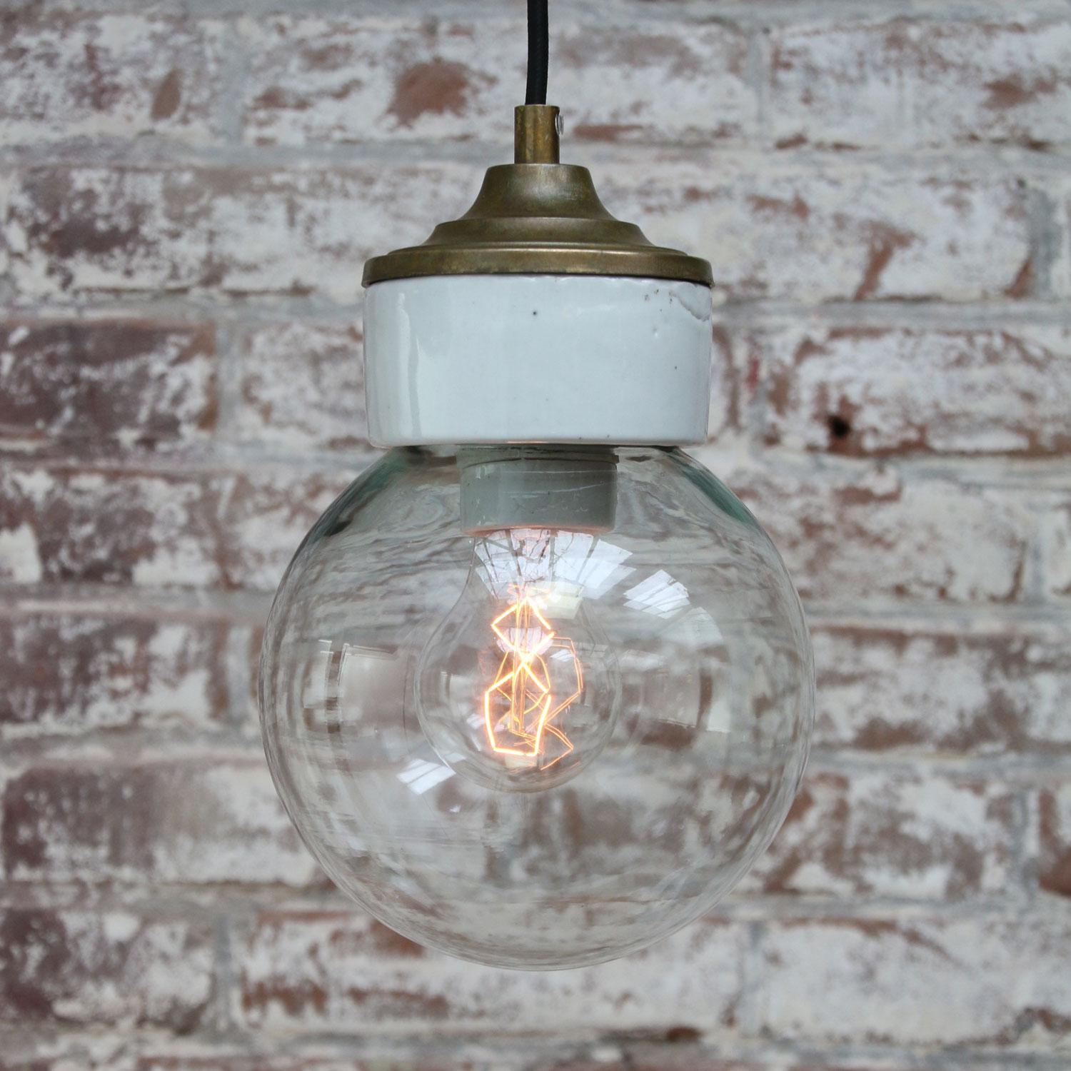 White Porcelain Clear Glass Vintage Industrial Brass Pendant Lights In Excellent Condition For Sale In Amsterdam, NL