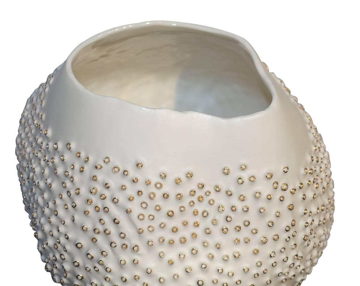 Contemporary Italian handmade white porcelain bowl with a coral decorative motif trimmed in gold leaf.
 