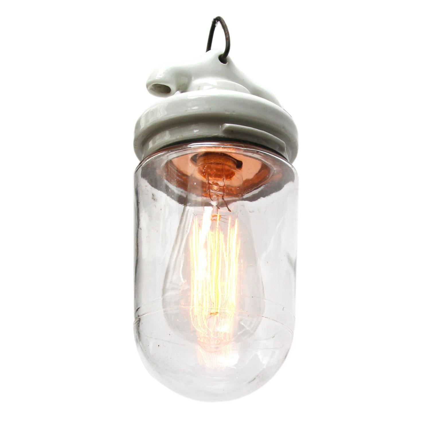 Porcelain hanging lamp.
White porcelain with clear glass.
2 conductors, no ground.

Weight: 1.00 kg / 2.2 lb

Priced per individual item. All lamps have been made suitable by international standards for incandescent light bulbs,