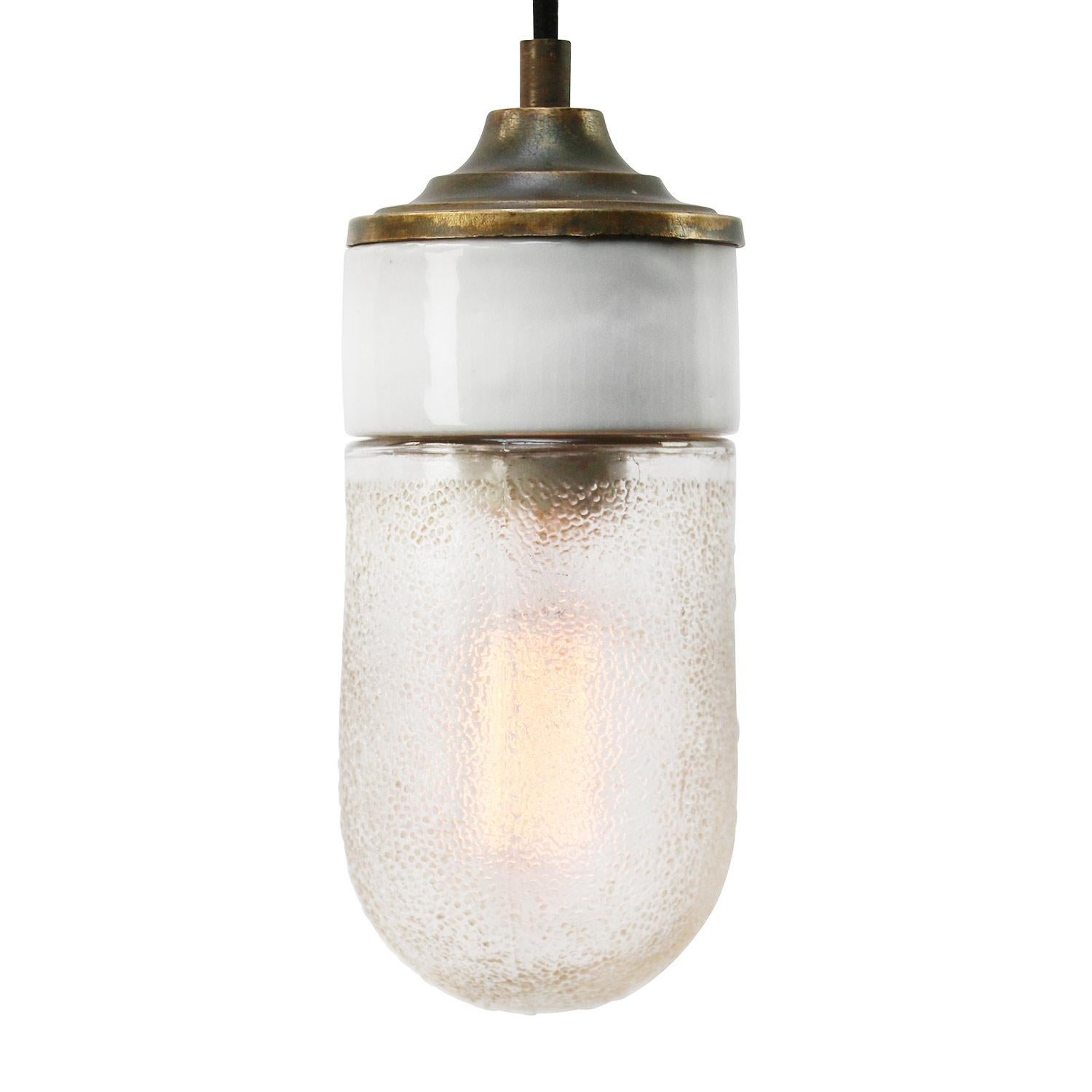 Porcelain Industrial hanging lamp.
White porcelain, brass and frosted glass.
2 conductors, no ground.

Weight: 2.00 kg / 4.4 lb

Priced per individual item. All lamps have been made suitable by international standards for incandescent light