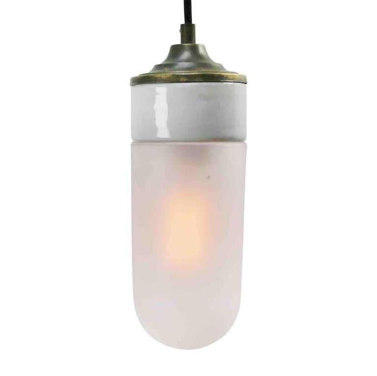 Porcelain Industrial hanging lamp.
White porcelain, brass and frosted glass.
2 conductors, no ground.

Weight: 2.00 kg / 4.4 lb

Priced per individual item. All lamps have been made suitable by international standards for incandescent light