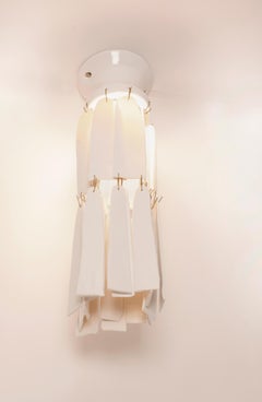 Lampe en porcelaine blanche avec glaçure blanche brillante de l'artiste danoise Christine Roland