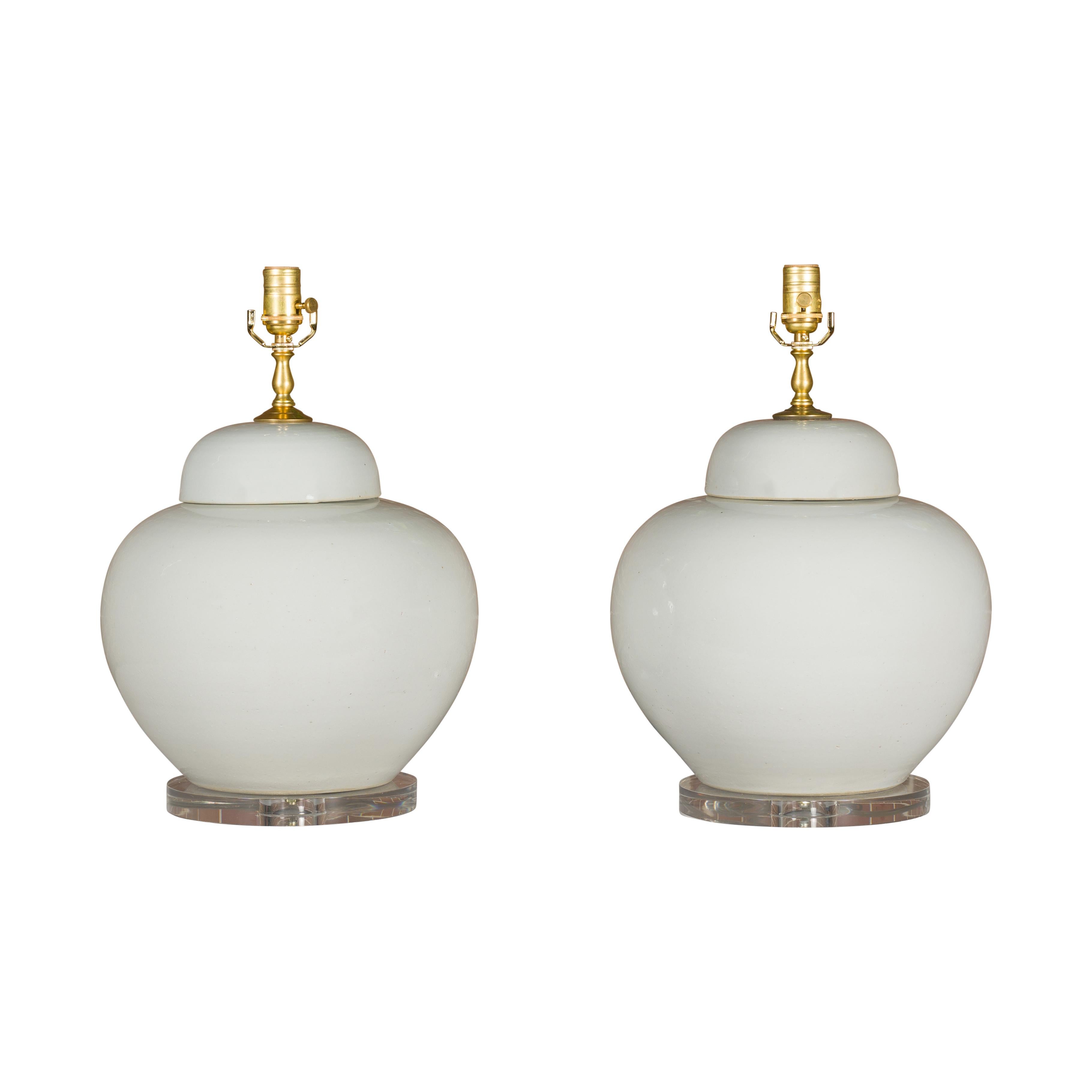 White Porcelain Lidded Urns Made into Wired Table Lamps on Lucite Bases, a Pair For Sale 9