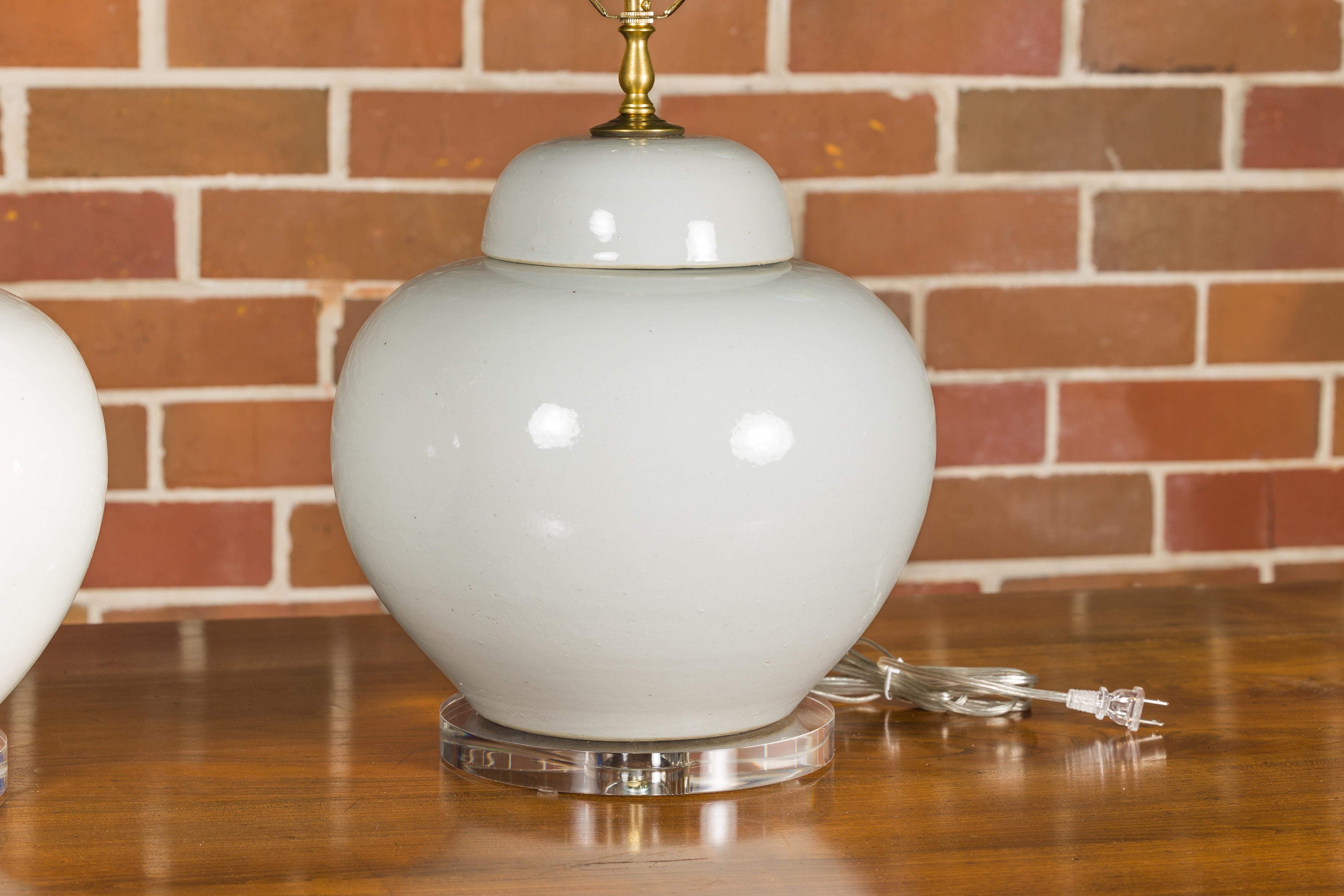 White Porcelain Lidded Urns Made into Wired Table Lamps on Lucite Bases, a Pair For Sale 5